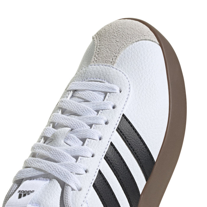 Women's white adidas sneaker toe and lace-up front with black 3-Stripes detail