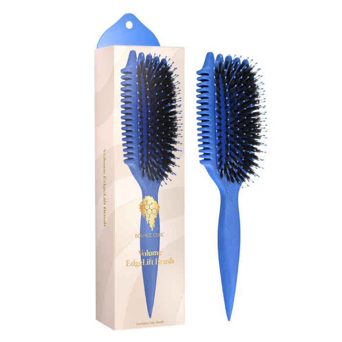 Blue hairbrush with packaging on a white background