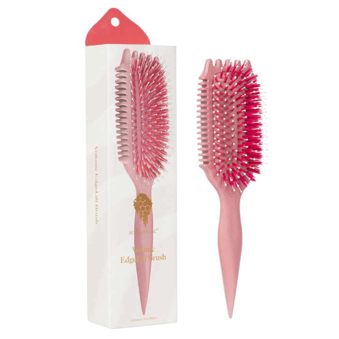 Bounce Curl Volume EdgeLift Brush in Raspberry standing next to product packaging
