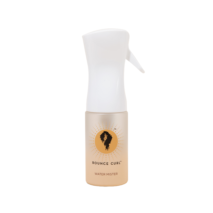 Bounce Curl water mister bottle with white top and beige body on a white background