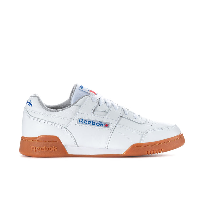 Men's white Reebok sneakers with blue/red side logo and tan rubber sole