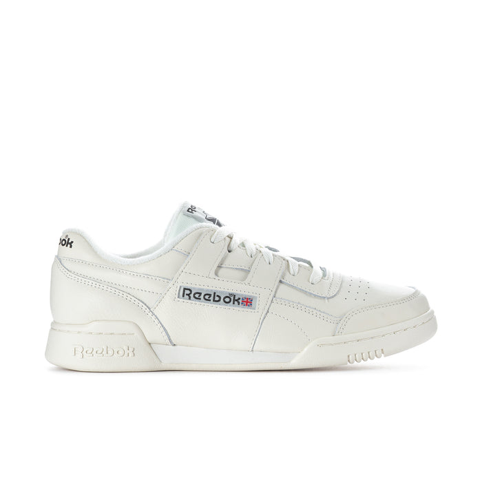 White low-top lace-up sneakers with Reebok logo and panel stitching.