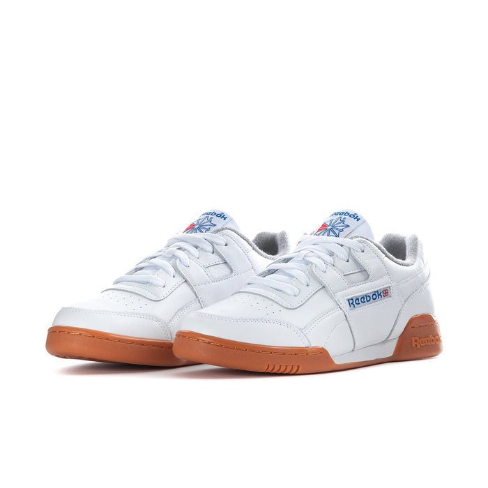 Men's white Reebok low-top sneakers, lace-up front, tan sole