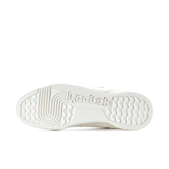 White rubber outsole with textured tread and Reebok logo stamp.