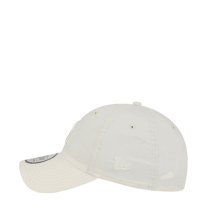 Light chrome white strapback cap with tonal NY logo on front