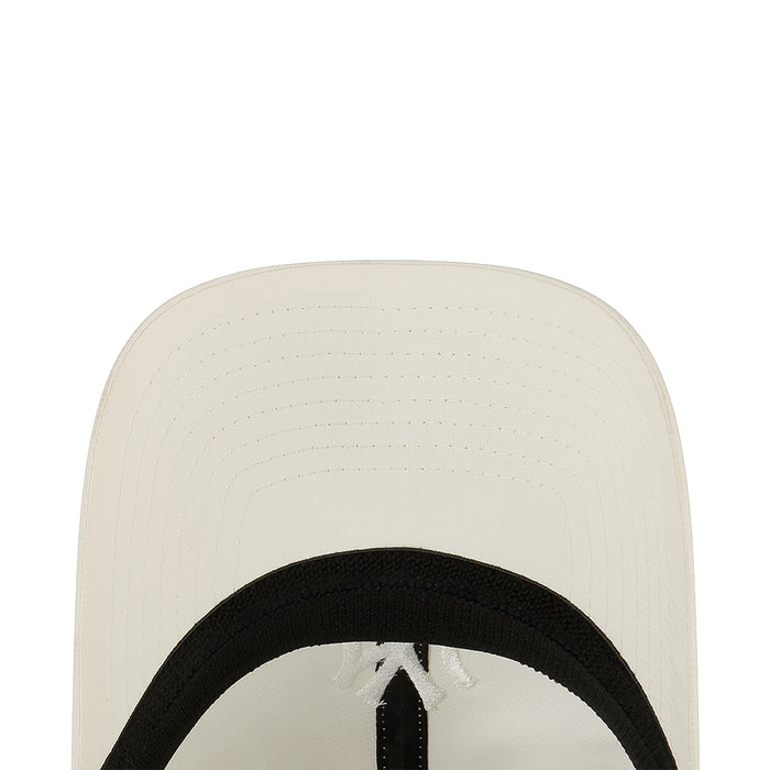 Light chrome white cap brim underside with black band and tonal NY emblem