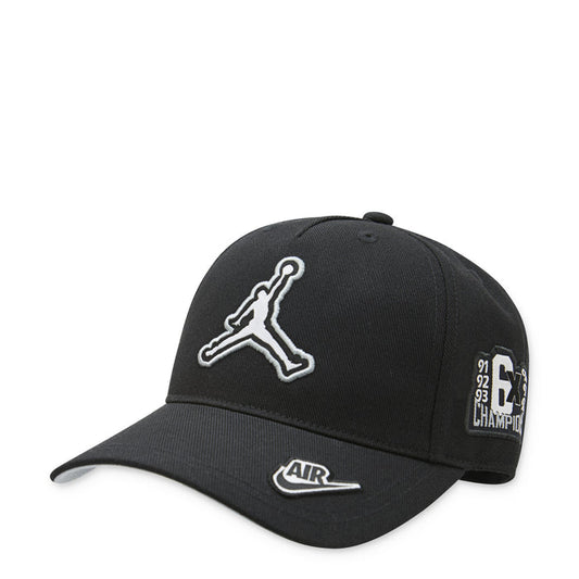 Youth Jordan black curved brim cap with white Jumpman logo and Air label
