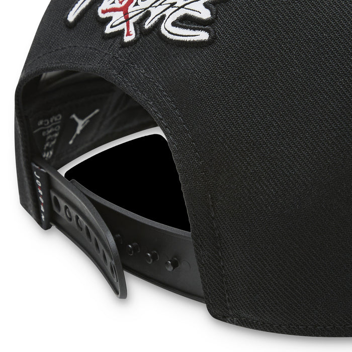 Youth Jordan black cap close-up of adjustable strap and interior opening