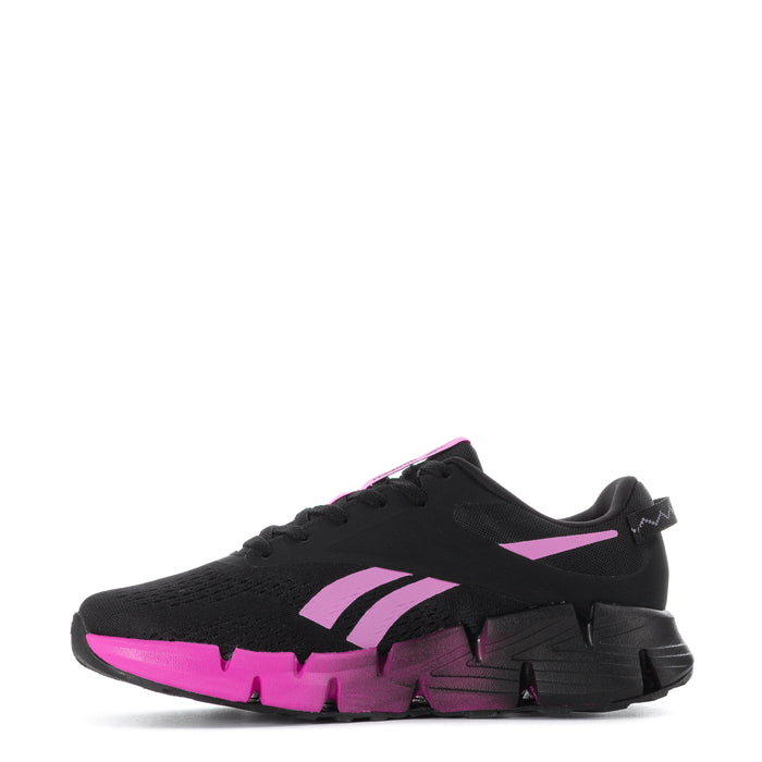 Youth black sneakers with pink side stripe and chunky molded outsole