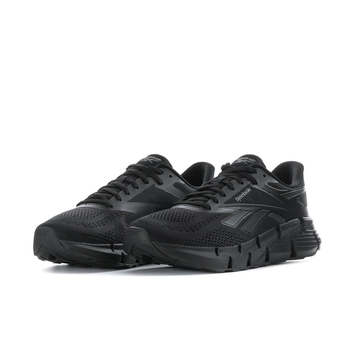 Men's black running shoe, side view, textured upper and sculpted tread sole
