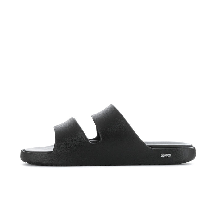Women's black slide sandals, front profile with thick contoured sole